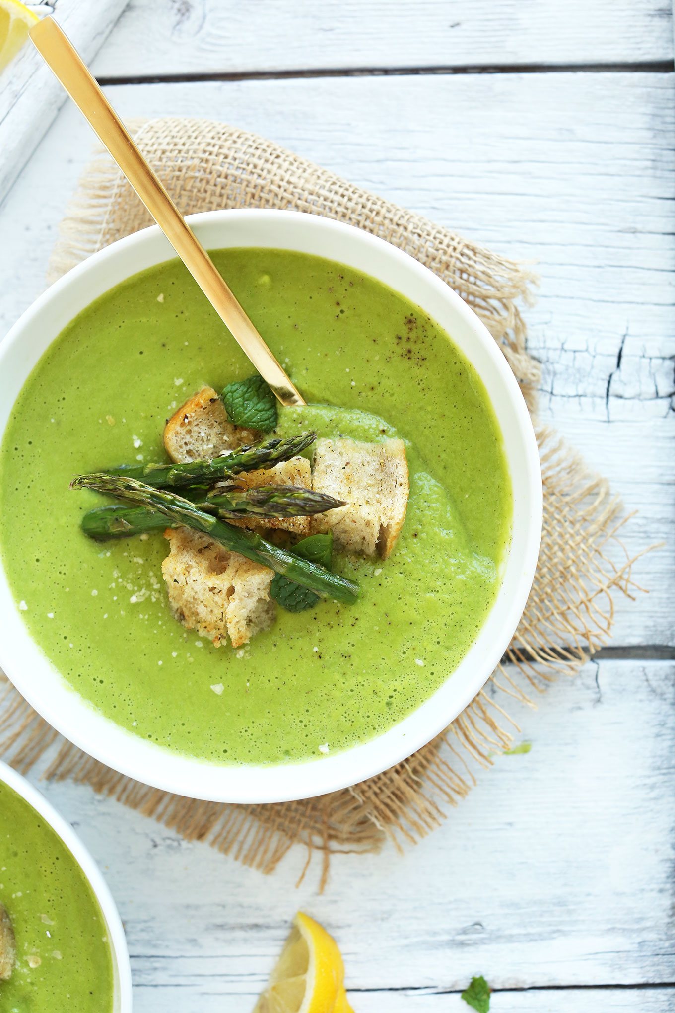 Bowl of Asparagus Pea Soup with Garlic Croutons for a delicious and healthy spring dinner
