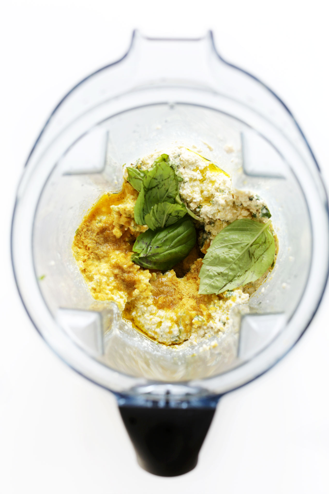 Blender with ingredients for making tofu filling for Vegan Lasagna Rolls
