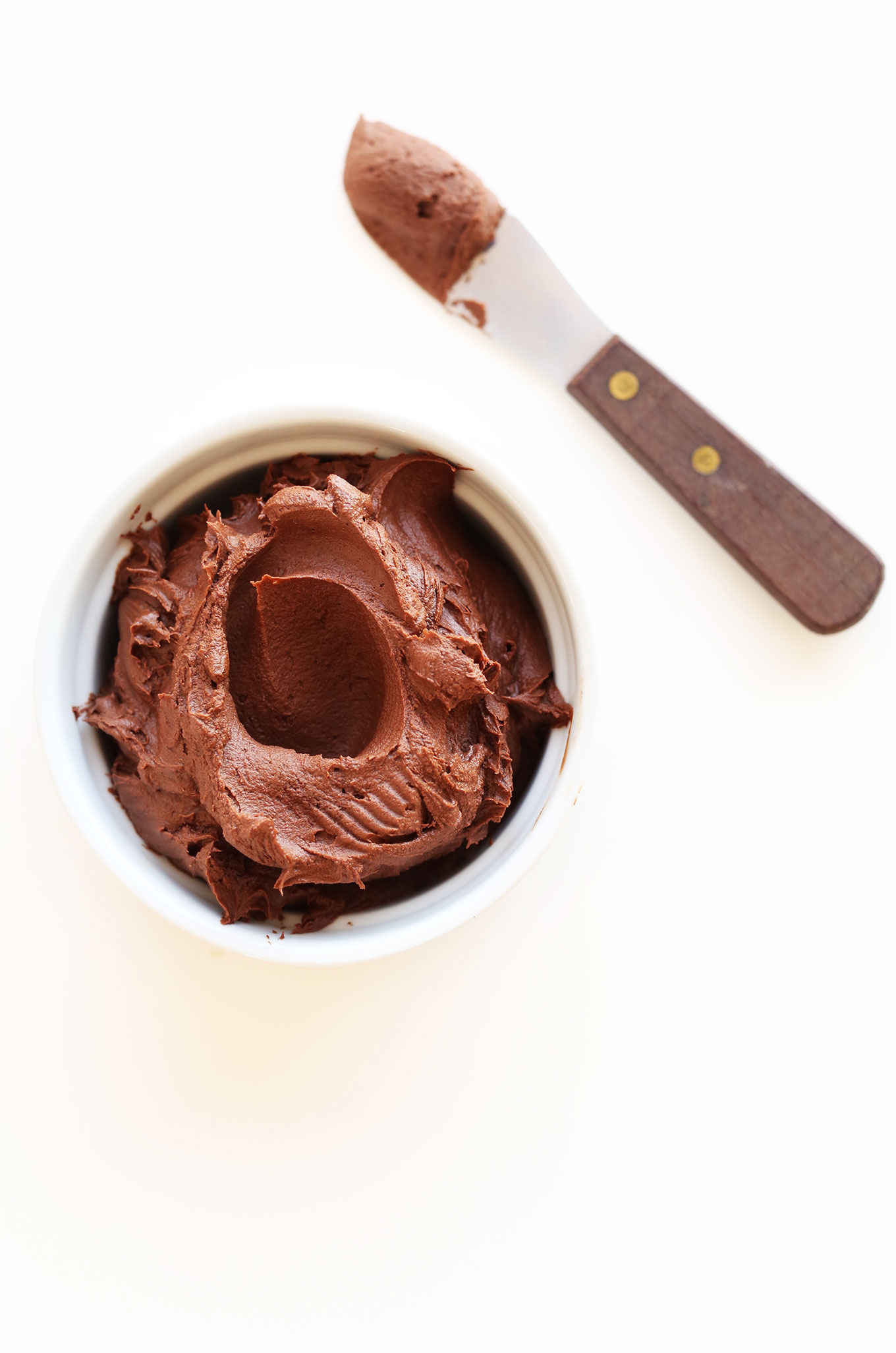 Bowl of homemade Vegan Chocolate Ganache Frosting