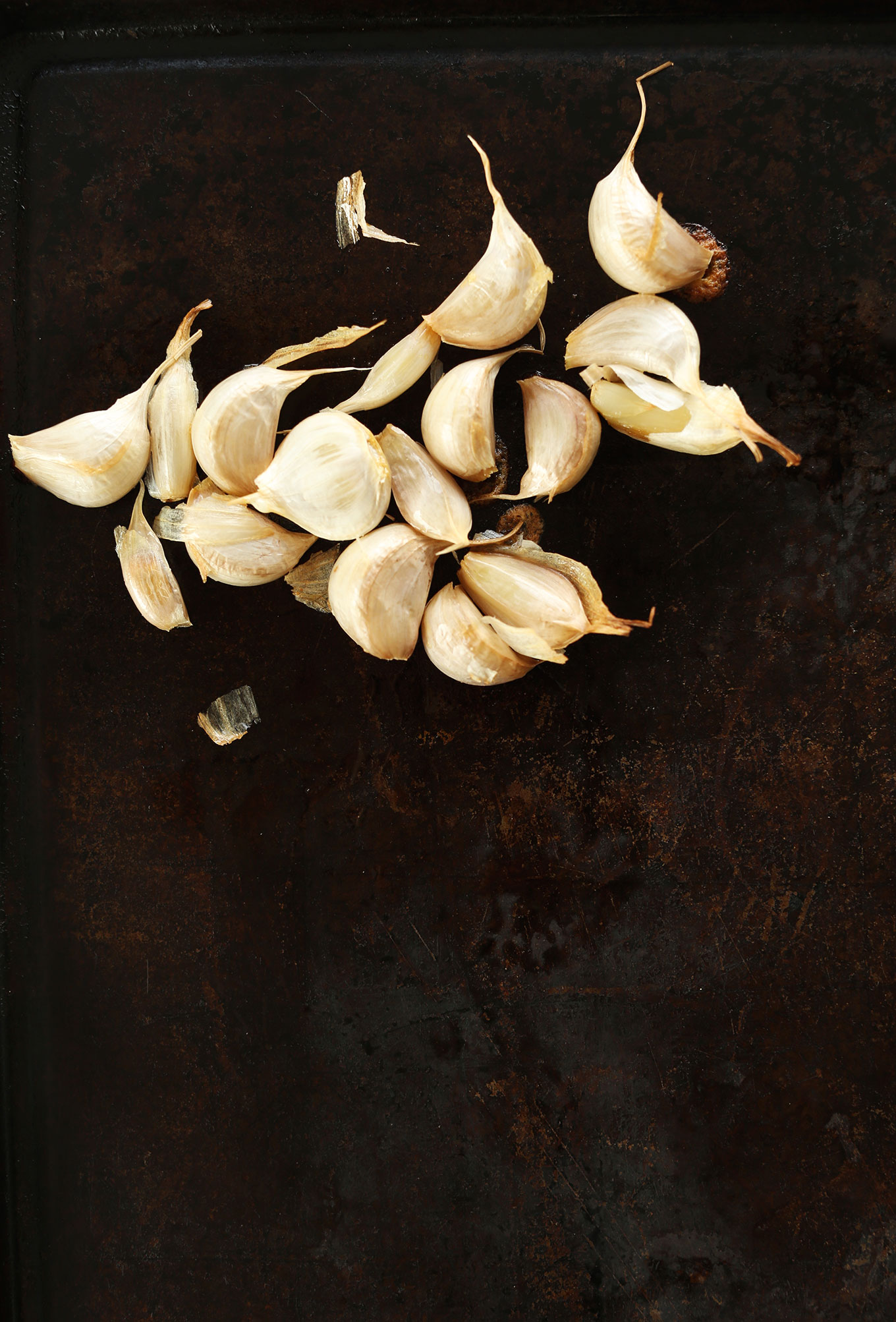 Cloves of garlic ready to be roasted