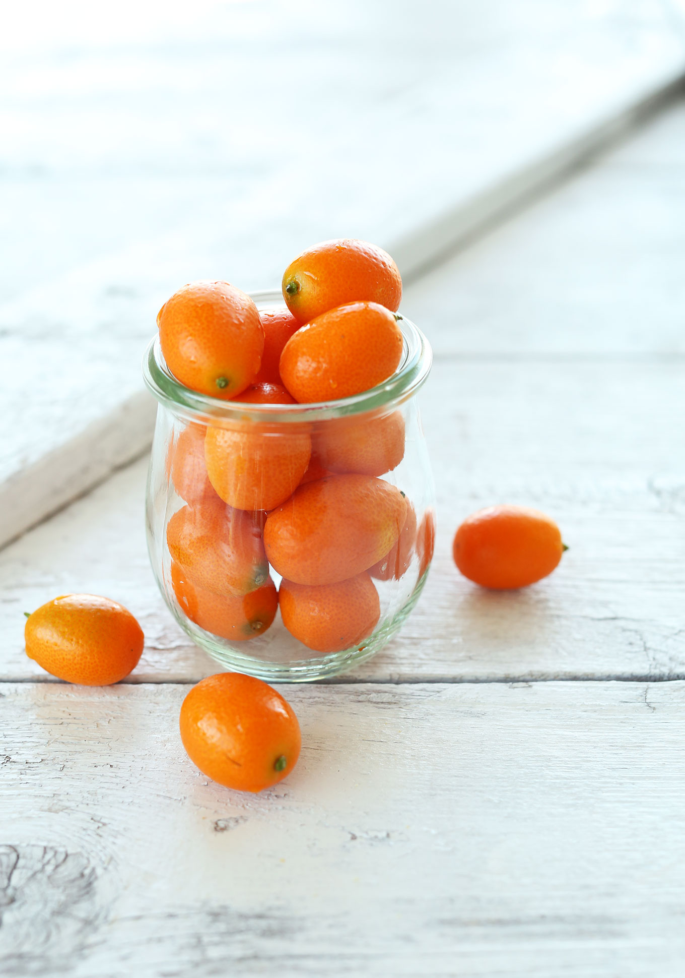 Jar of adorable kumquats for making homemade Gin and Tonics