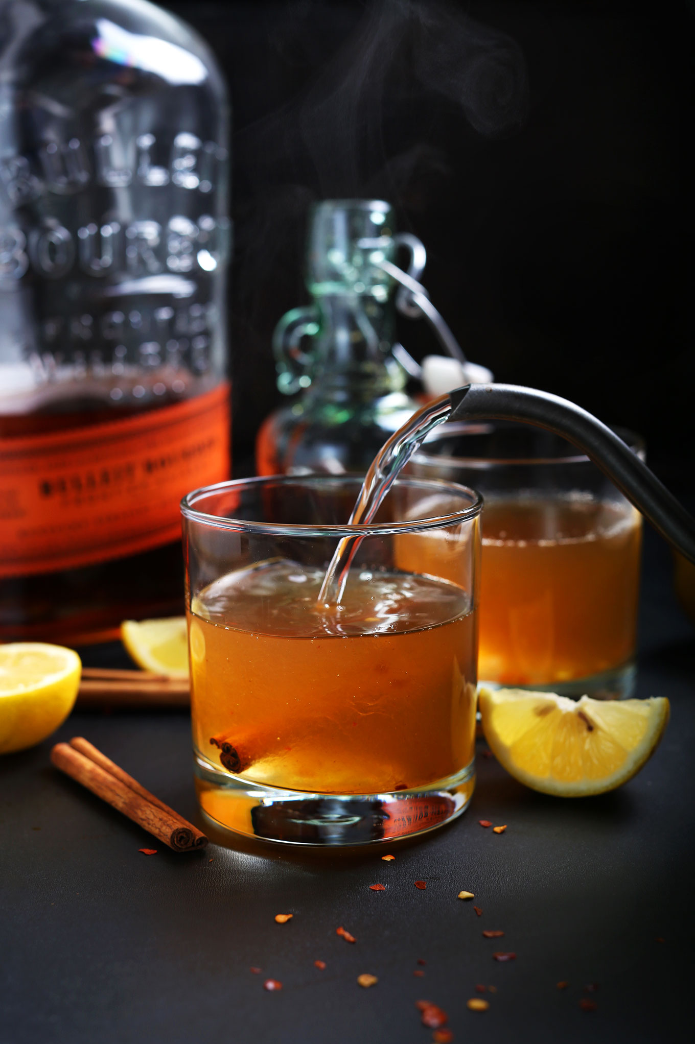 Making a naturally-sweetened Chili Cinnamon Hot Toddy for a warming vegan drink