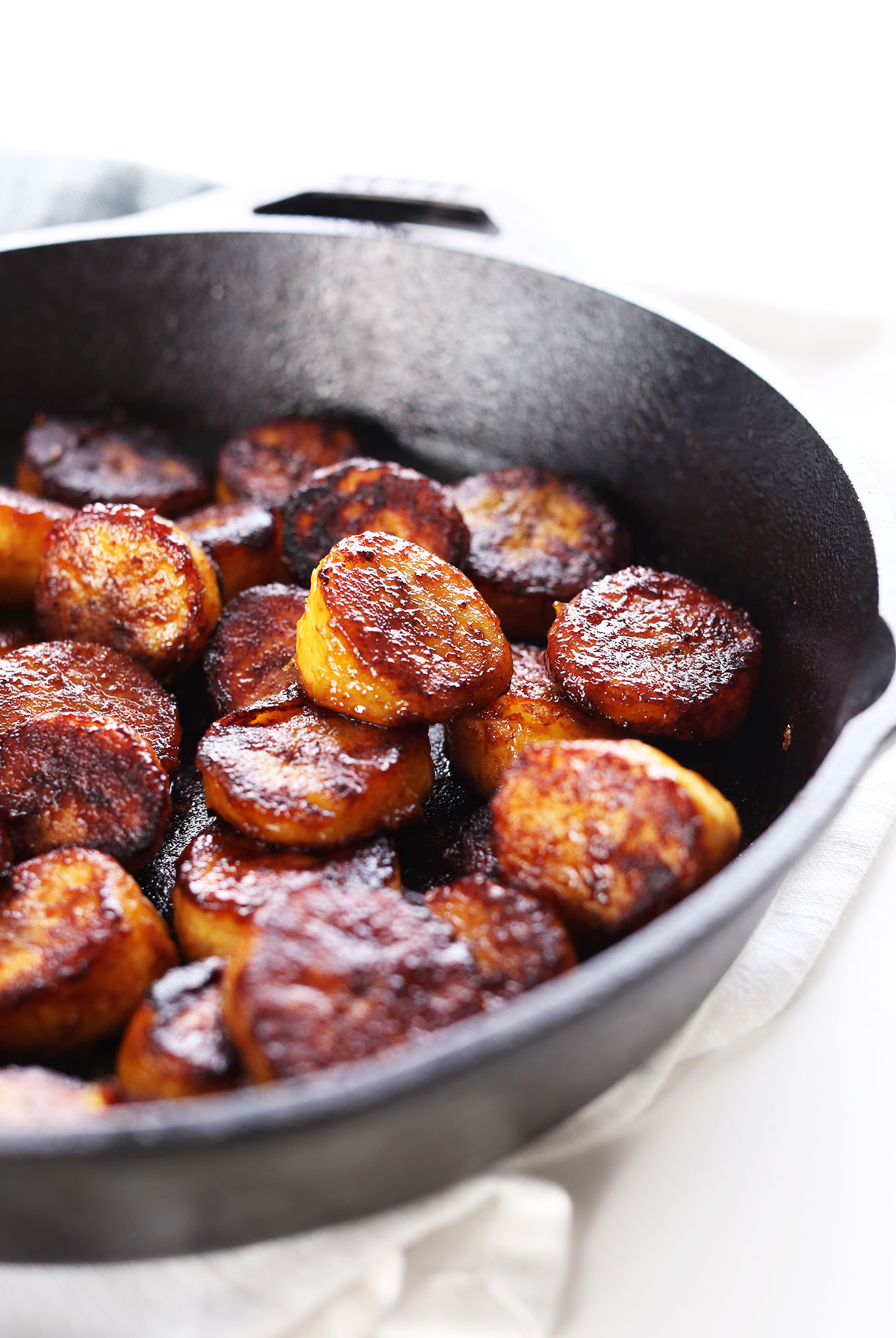 Easy Vegan Caramelized Plantains in a cast-iron skillet