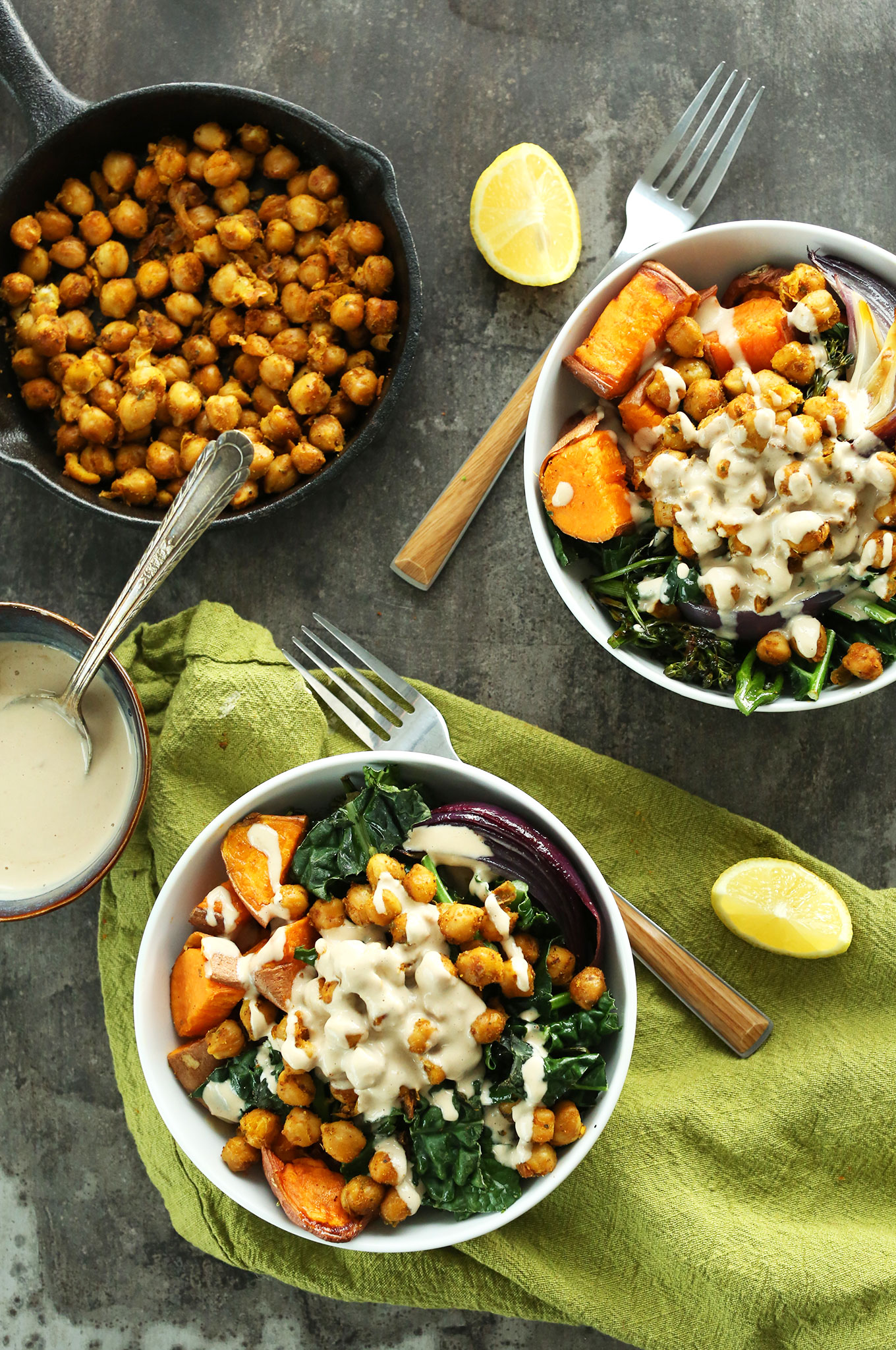 Chickpea Sweet Potato Buddha Bowls with extra chickpeas in a cast-iron skillet