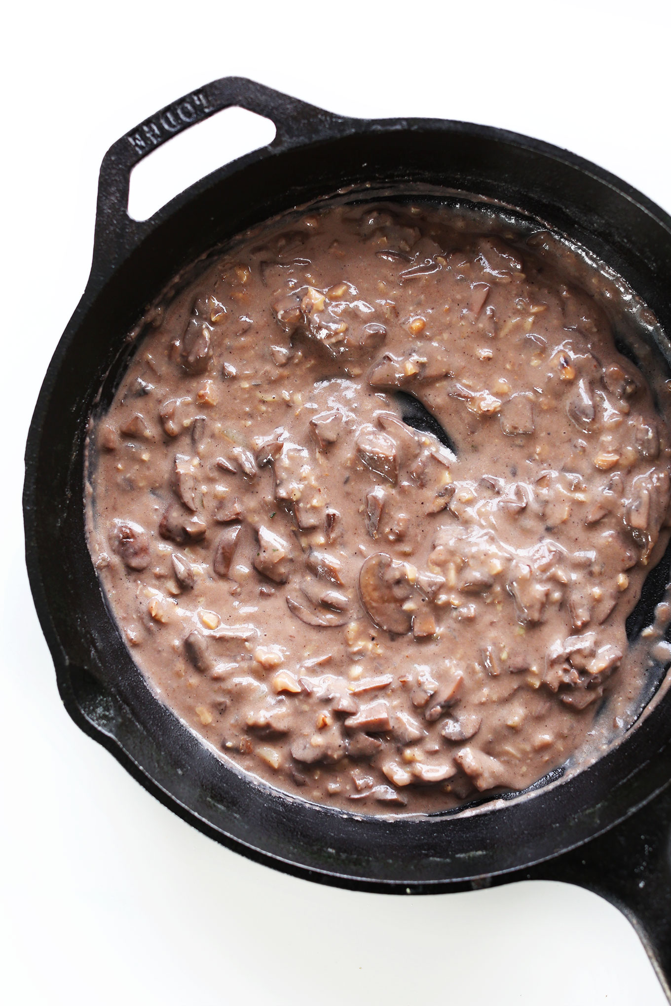 Cast-iron skillet filled with our gluten-free vegan Mushroom gravy recipe