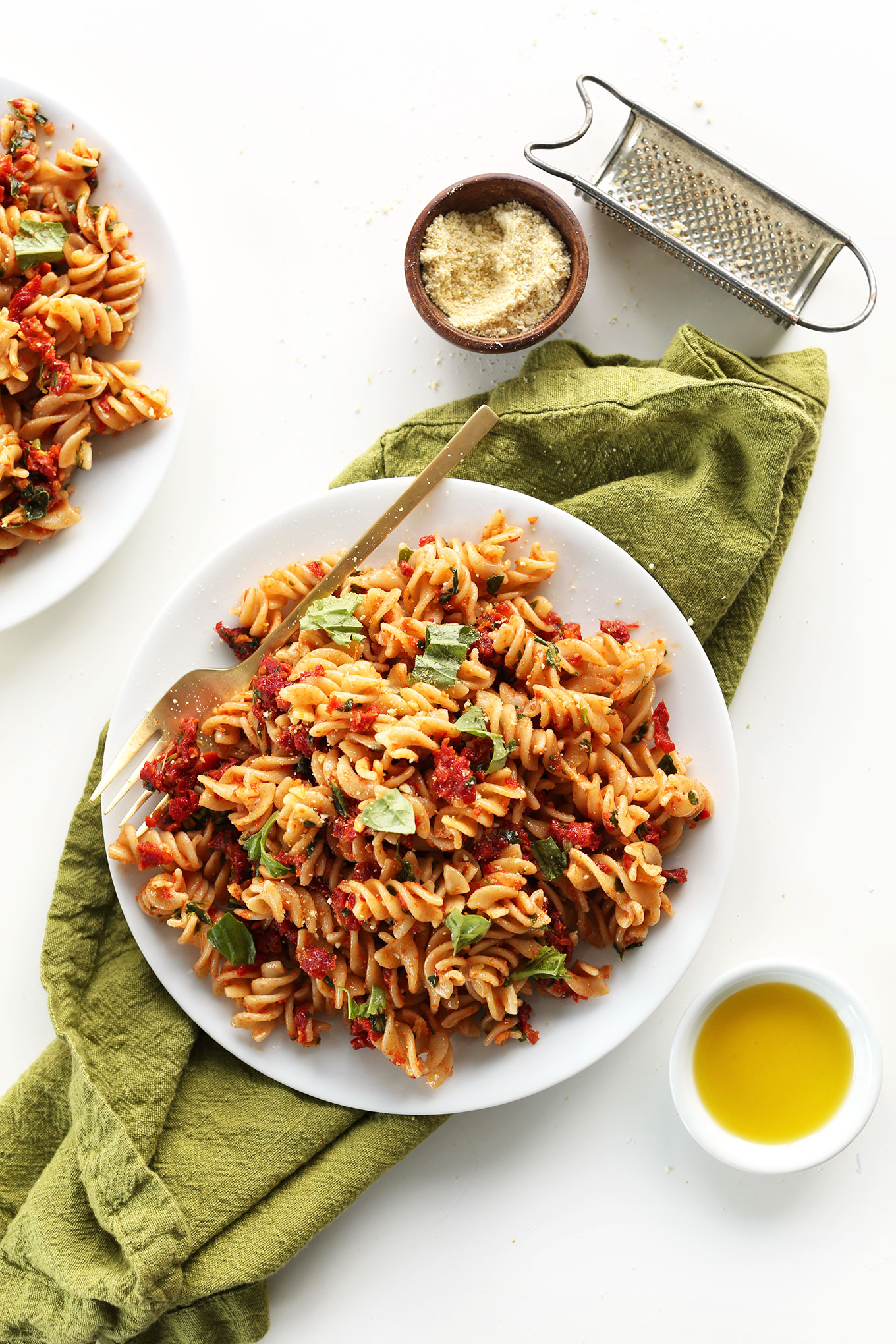 Dinner plate filled with our delicious and simple Sun-Dried Tomato Pesto Pasta