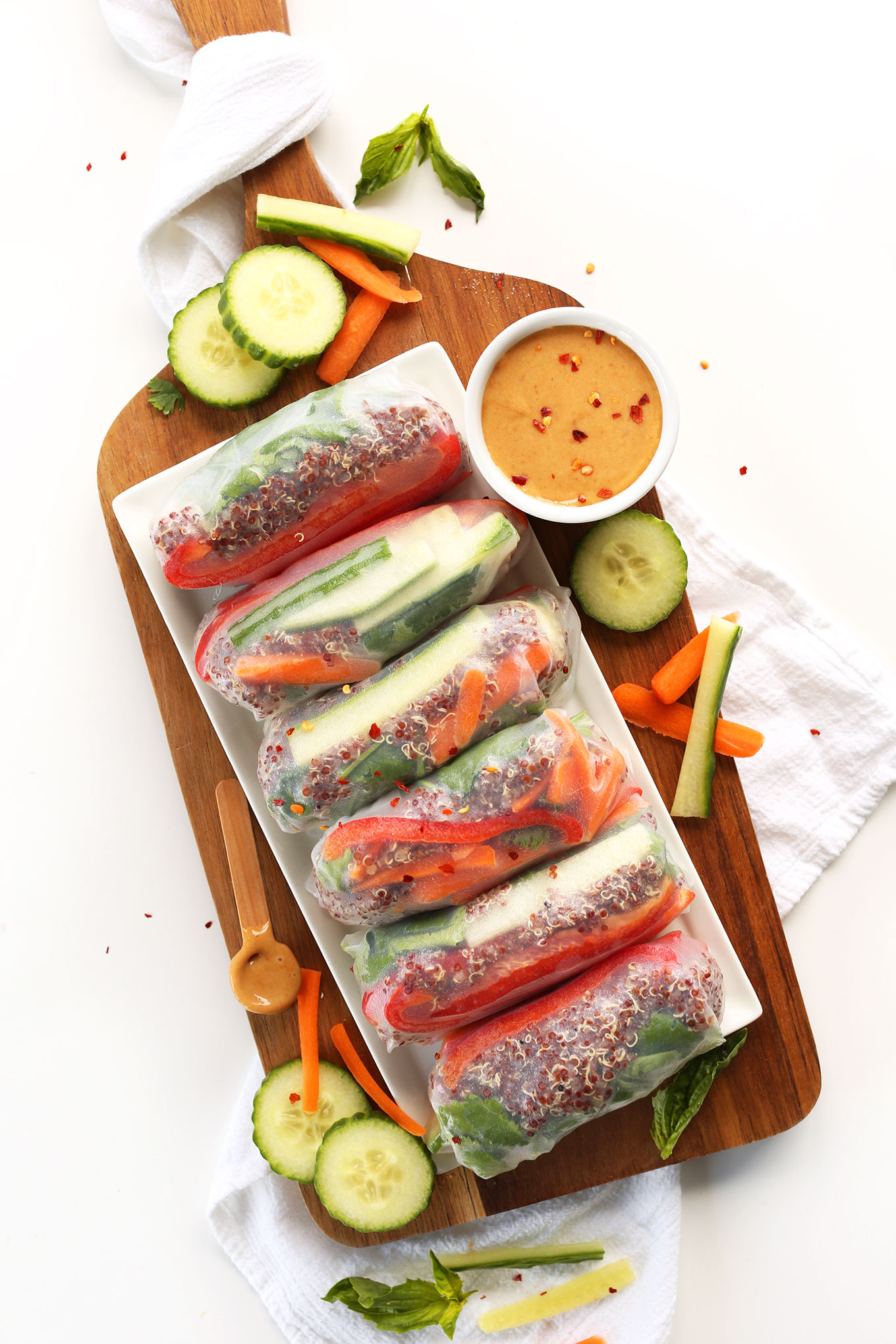 Platter of Quinoa Spring Rolls with a bowl of Cashew Dipping Sauce