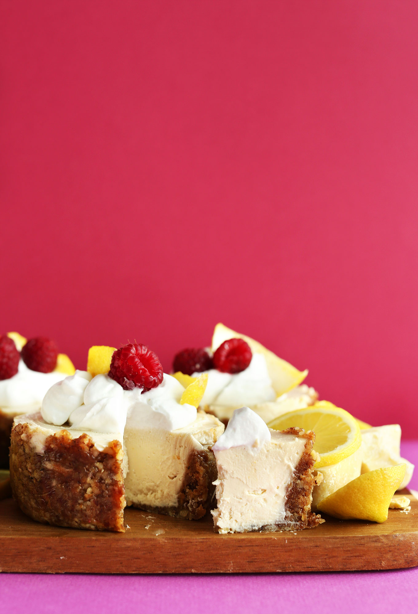 Mini slice cut out of a gluten-free vegan Lemon White Chocolate Cheesecake