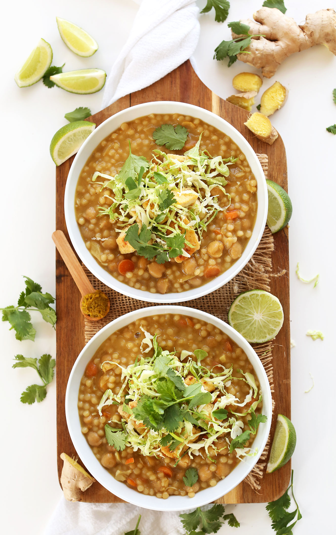 Bowls of Green Chickpea Curry with Israeli Couscous for a quick vegan dinner