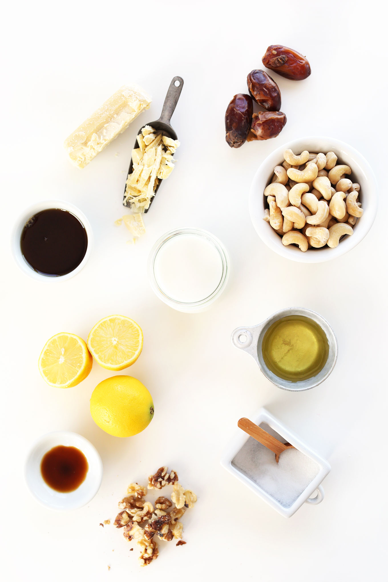 Ingredients laid out for making delicious gluten-free vegan White Chocolate Lemon Cheesecakes