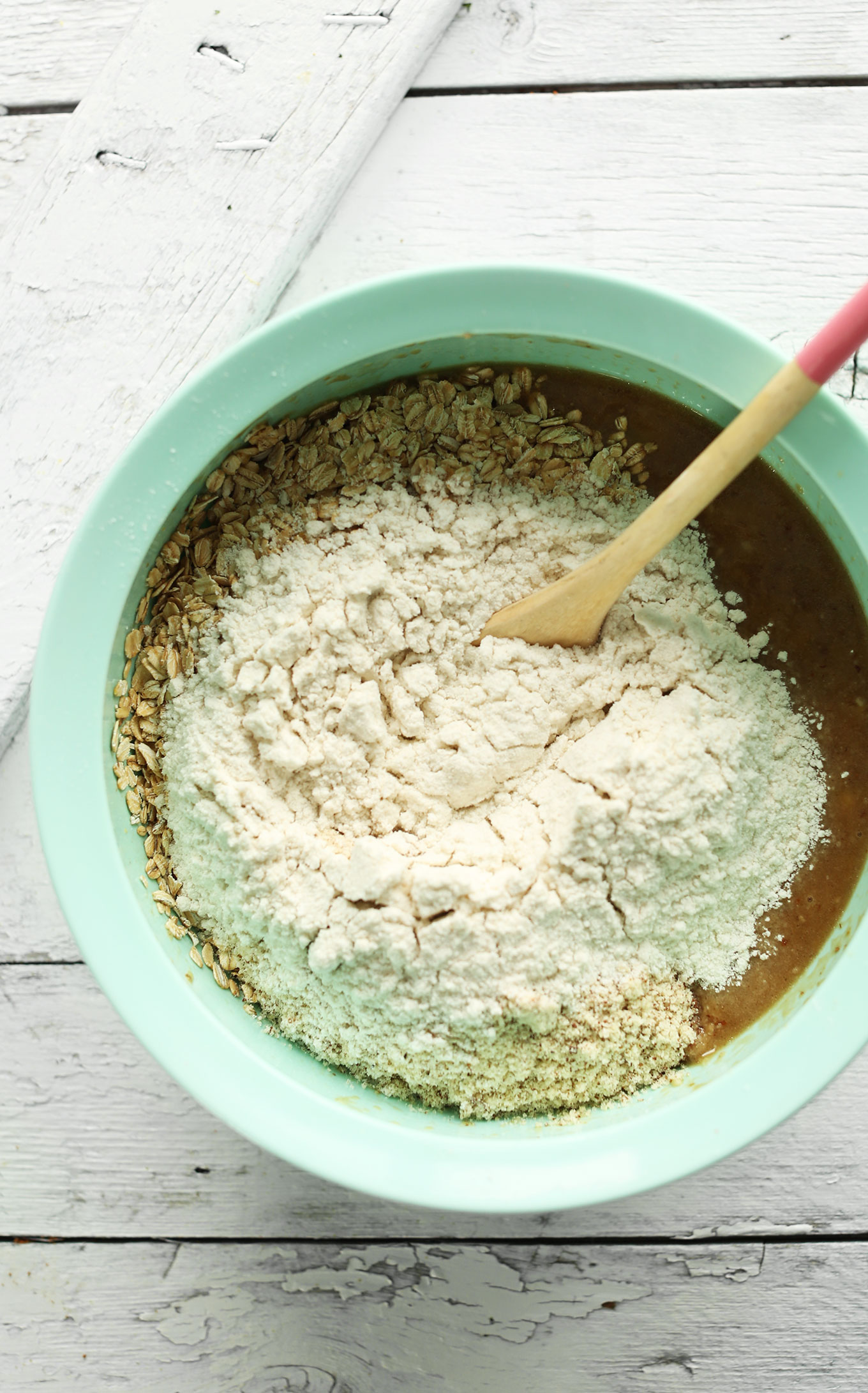 Adding dry ingredients for our vegan gluten-free Nutella Banana Bread recipe