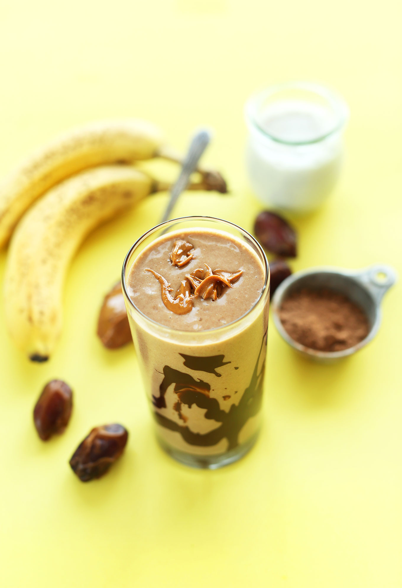 Tall glass of our creamy Peanut Butter Banana Milkshake recipe