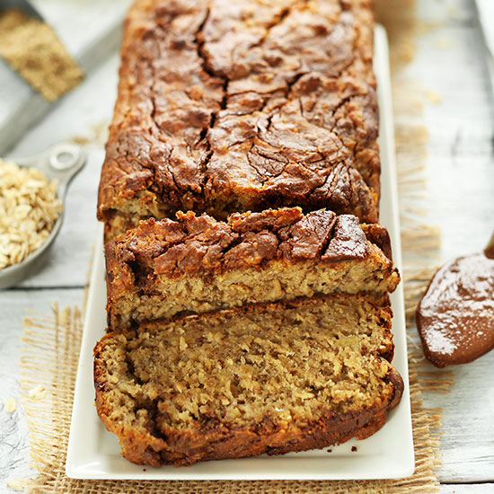 Partially sliced loaf of Vegan GF Nutella Banana Bread