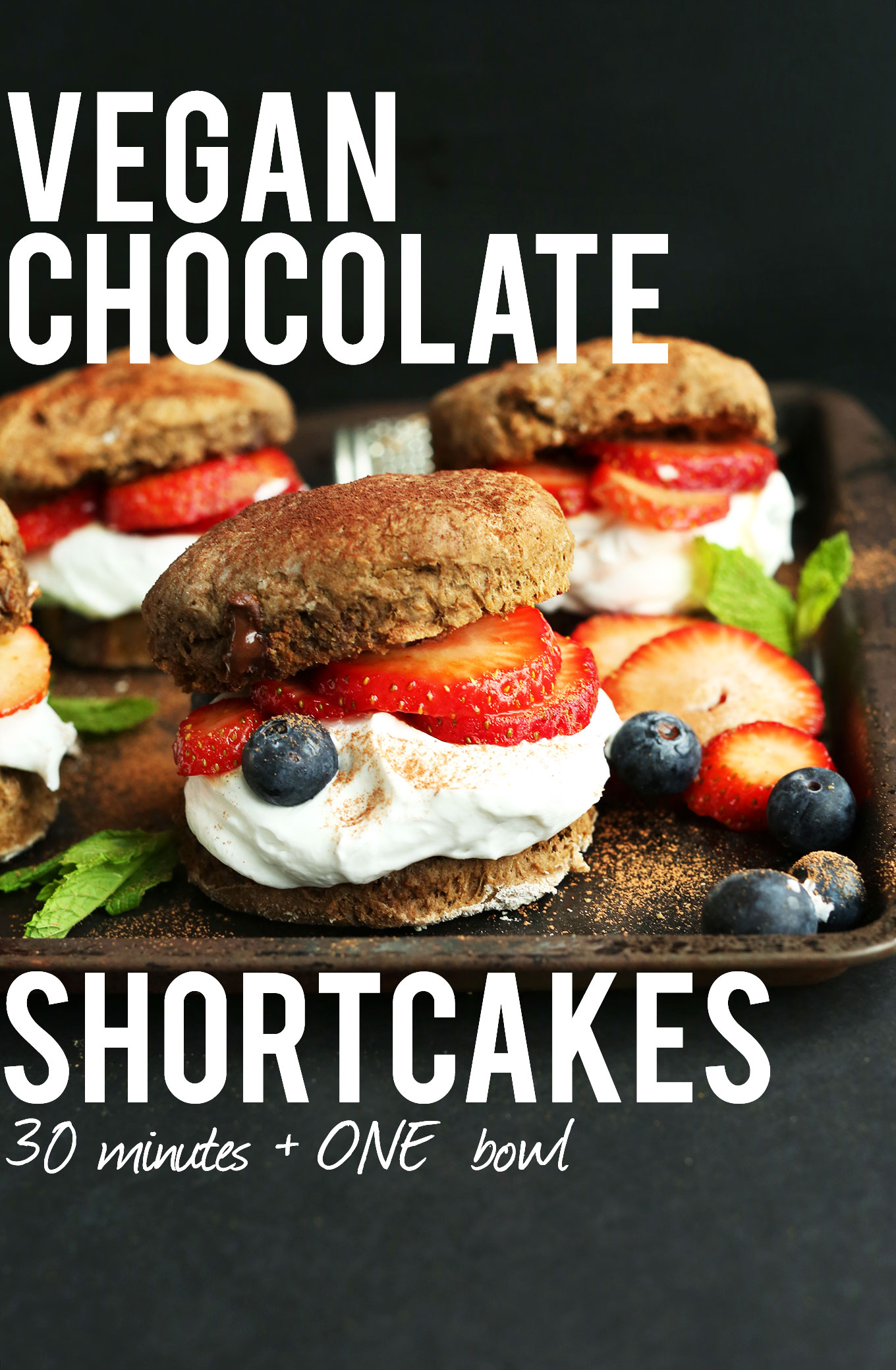 Baking sheet filled with Vegan Chocolate Shortcakes with dark chocolate chips for an effortless dessert