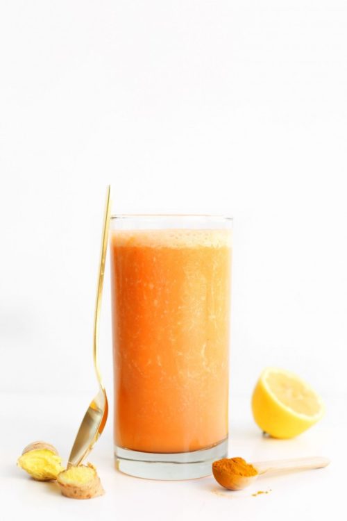 Glass of our Carrot Ginger Turmeric vegan smoothie recipe