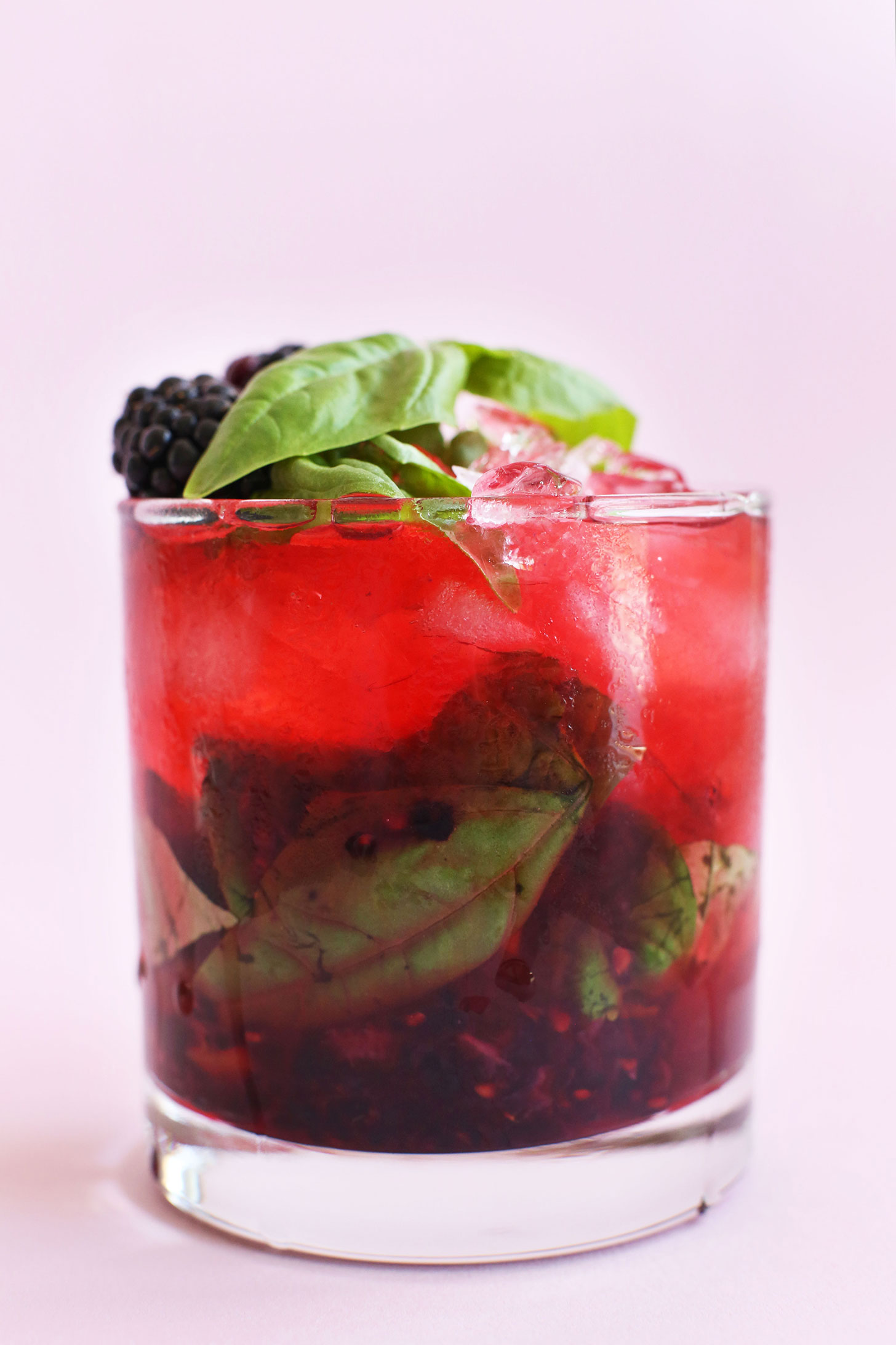 Glass of our Summery Blackberry Basil Mojito recipe for a refreshing, tart, and sweet cocktail