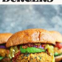 Photo of a vegan burger on a bun with toppings with text above it saying Green Chili Veggie Burgers ready in 30 minutes