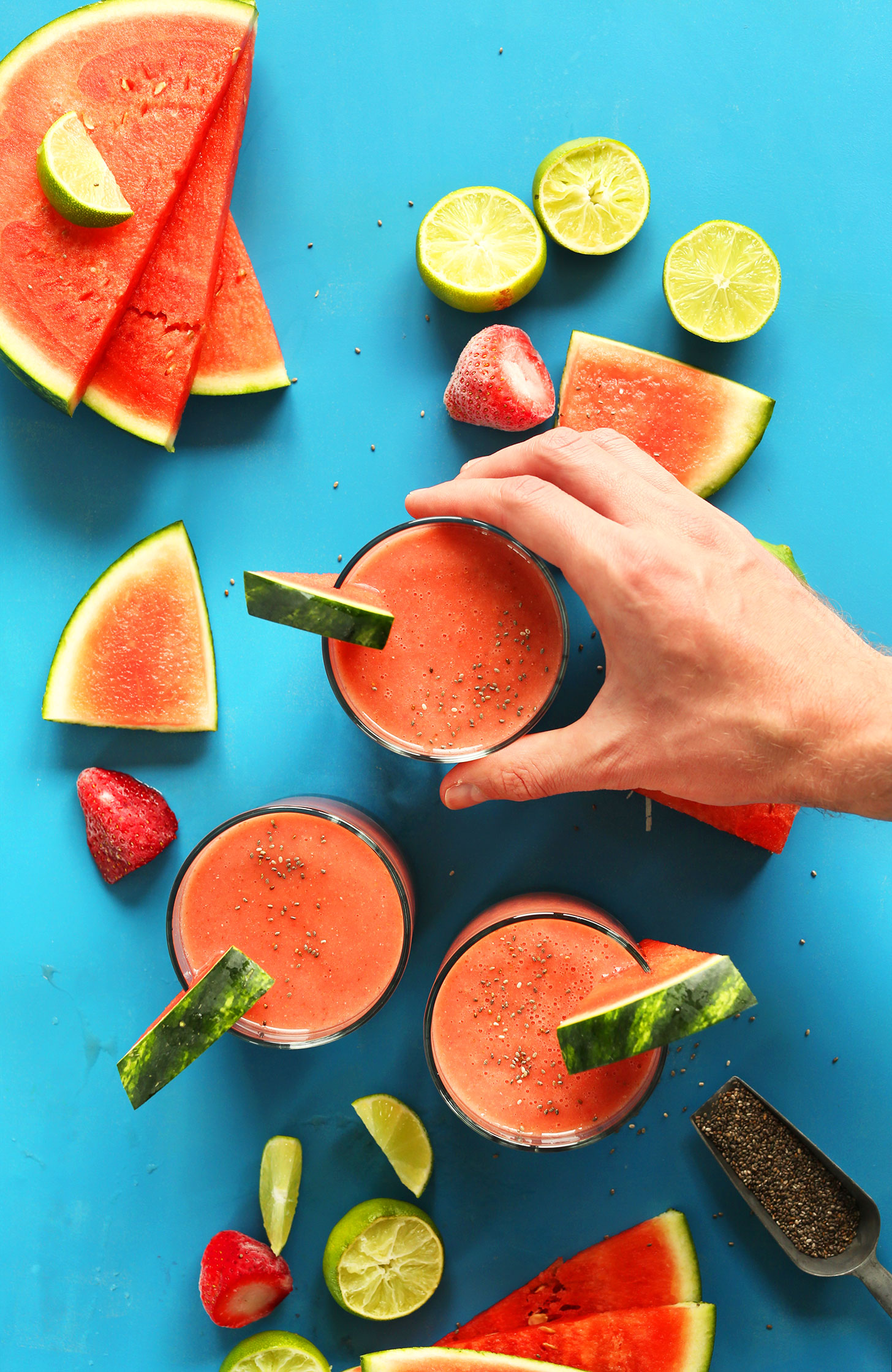 Grabbing a glass of our Refreshing Watermelon Smoothie with Strawberries, Lime, and Chia Seeds