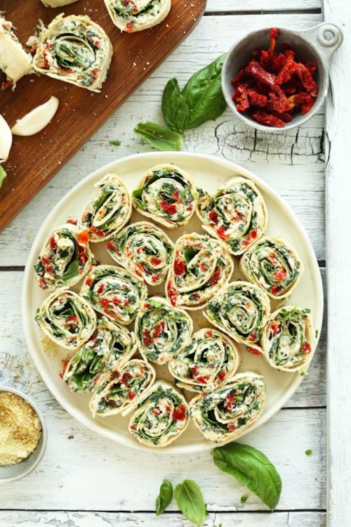 Plate of Sun-Dried Tomato and Basil Pinwheels for a delicious vegan snack