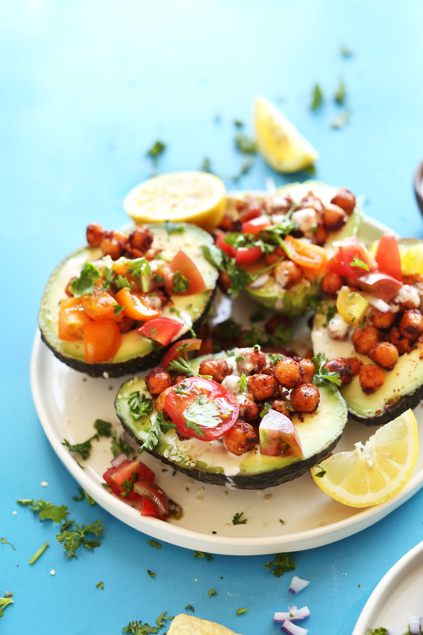 Plate of our Mediterranean-inspired Avocado Boats for a healthy vegan dinner recipe