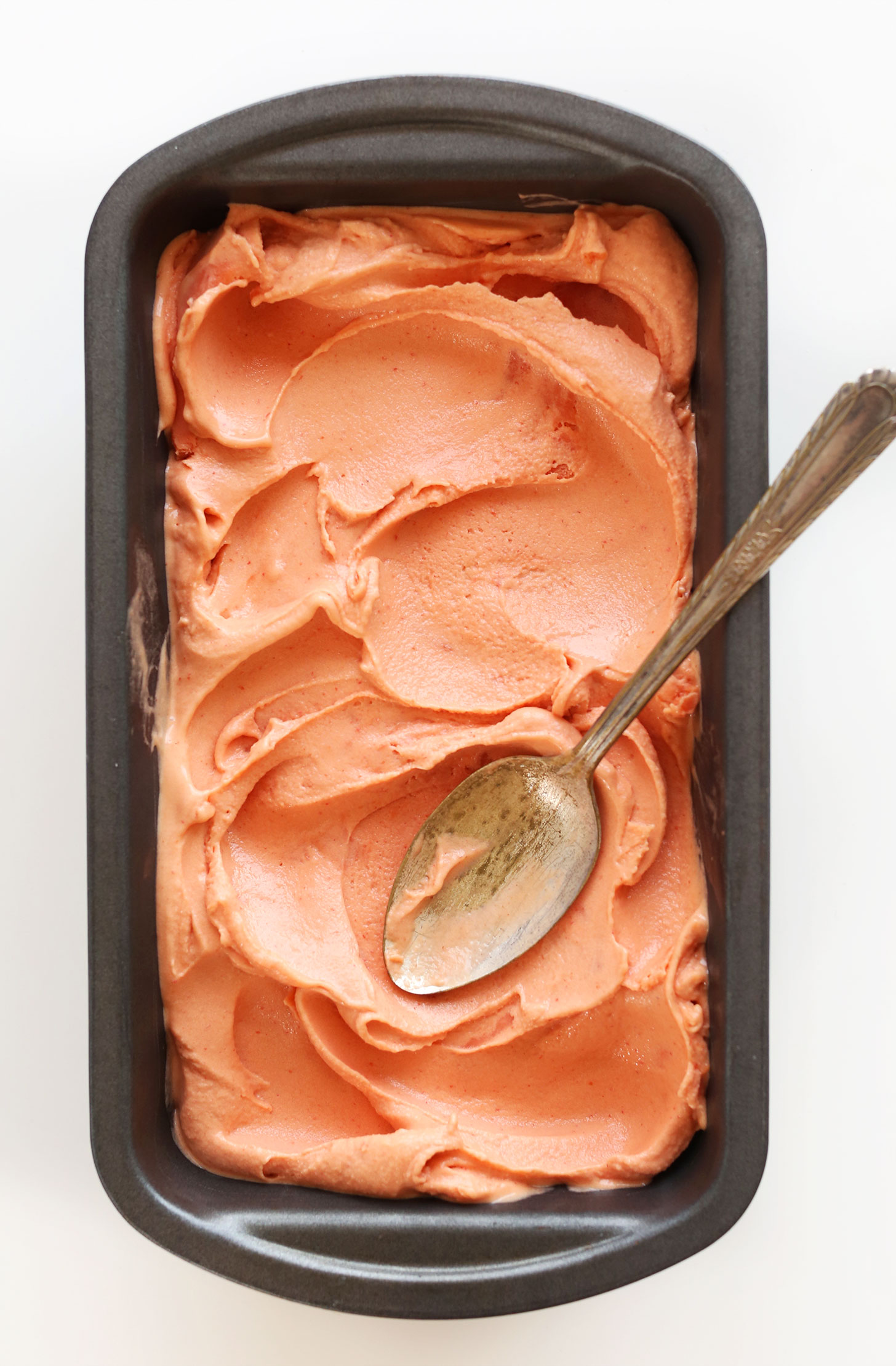 Pan of homemade gluten-free vegan Mango Raspberry Coconut Sorbet