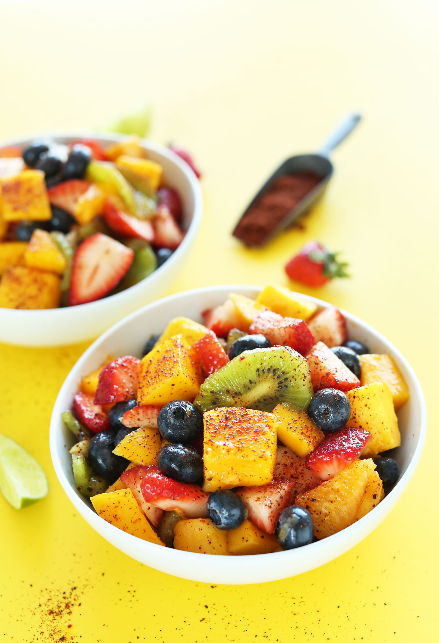 Bowls of our amazing vegan Fruit Salad with lime juice and chili powder