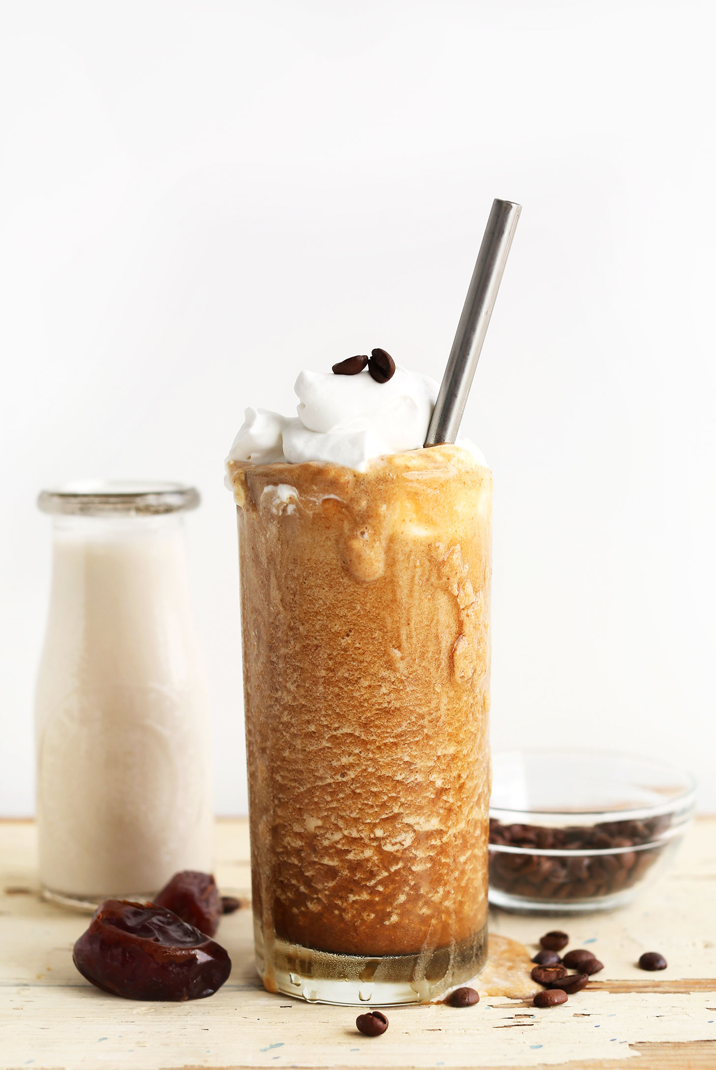 Large glass of our homemade gluten-free vegan Caramel Frappuccino with Almond Milk Ice Cubes