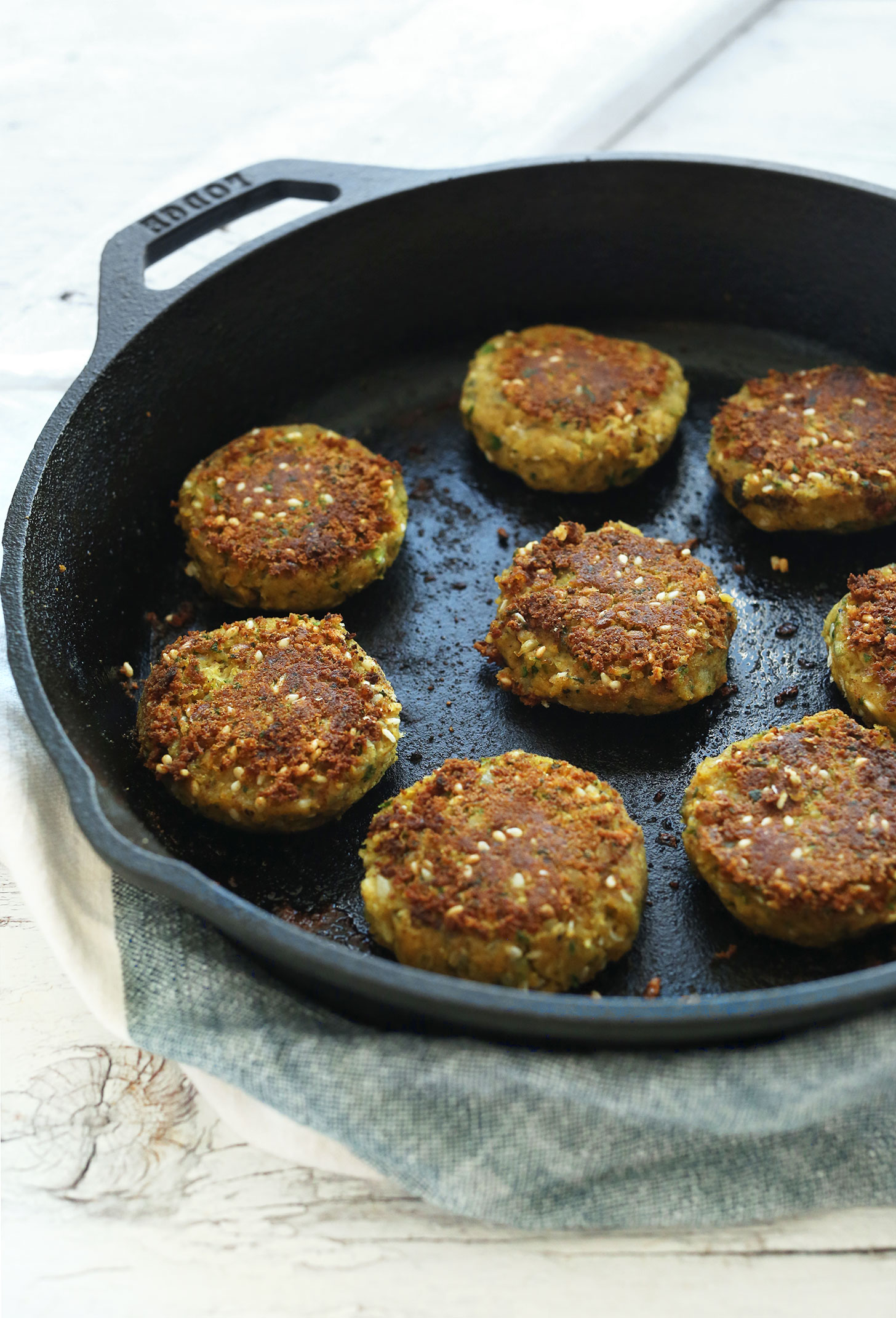 Cooking easy vegan falafel in a cast-iron skillet