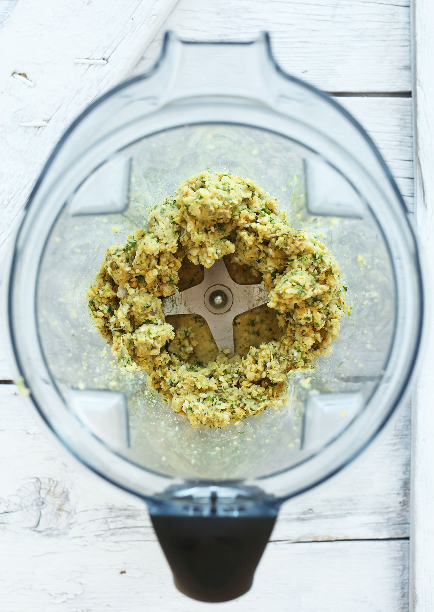 Blender with ingredients for making easy homemade vegan falafel