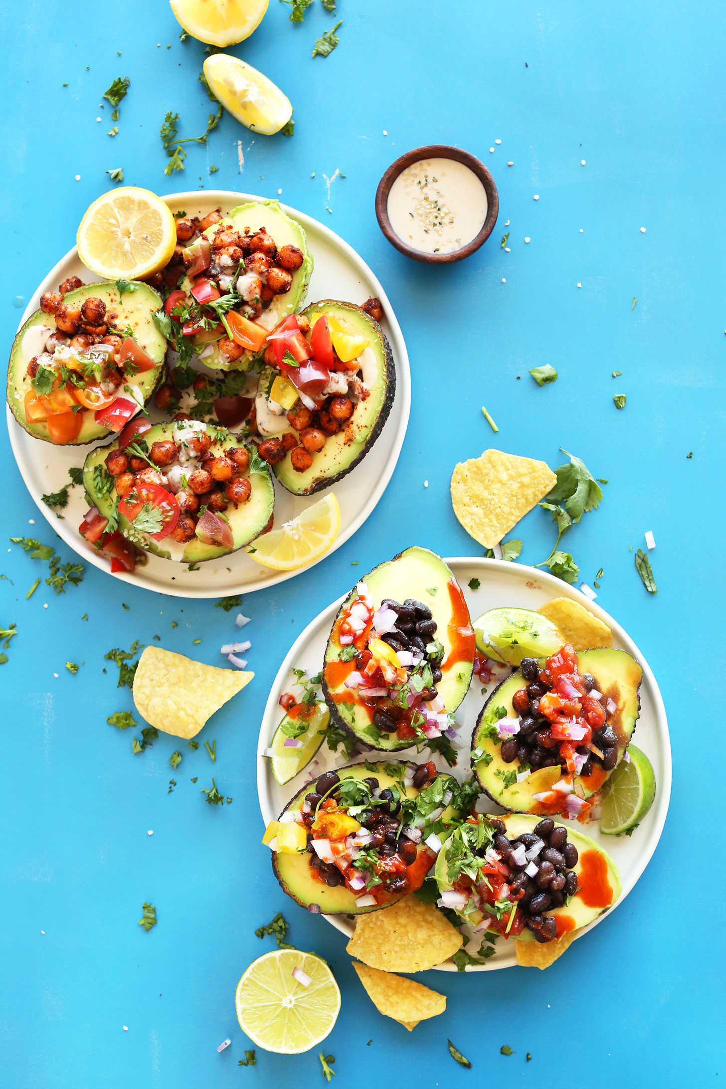 Plates of delicious Avocado Boats for a simple vegan dinner
