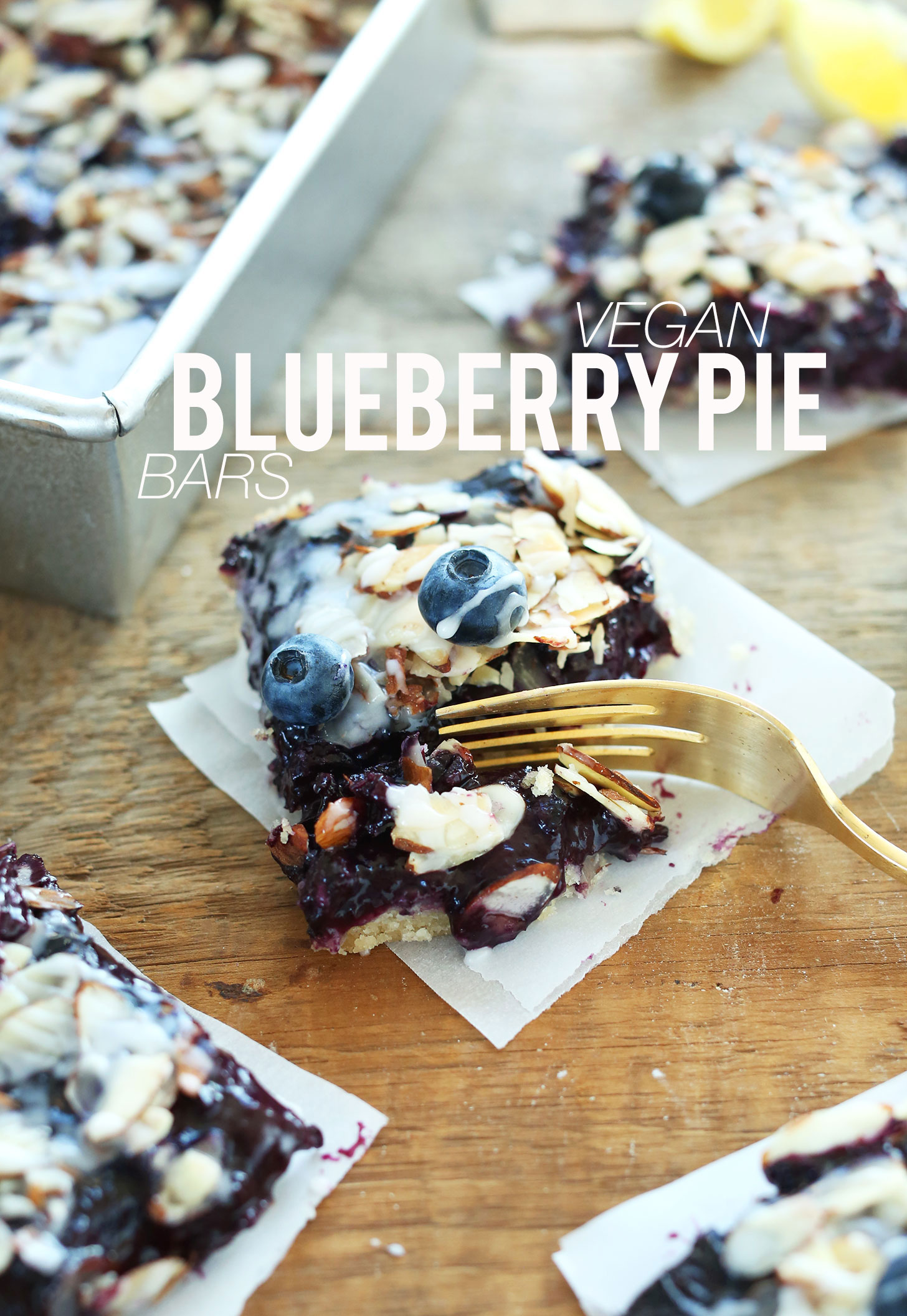 Grabbing a bite of a Vegan Blueberry Pie Bar for a delicious summer dessert