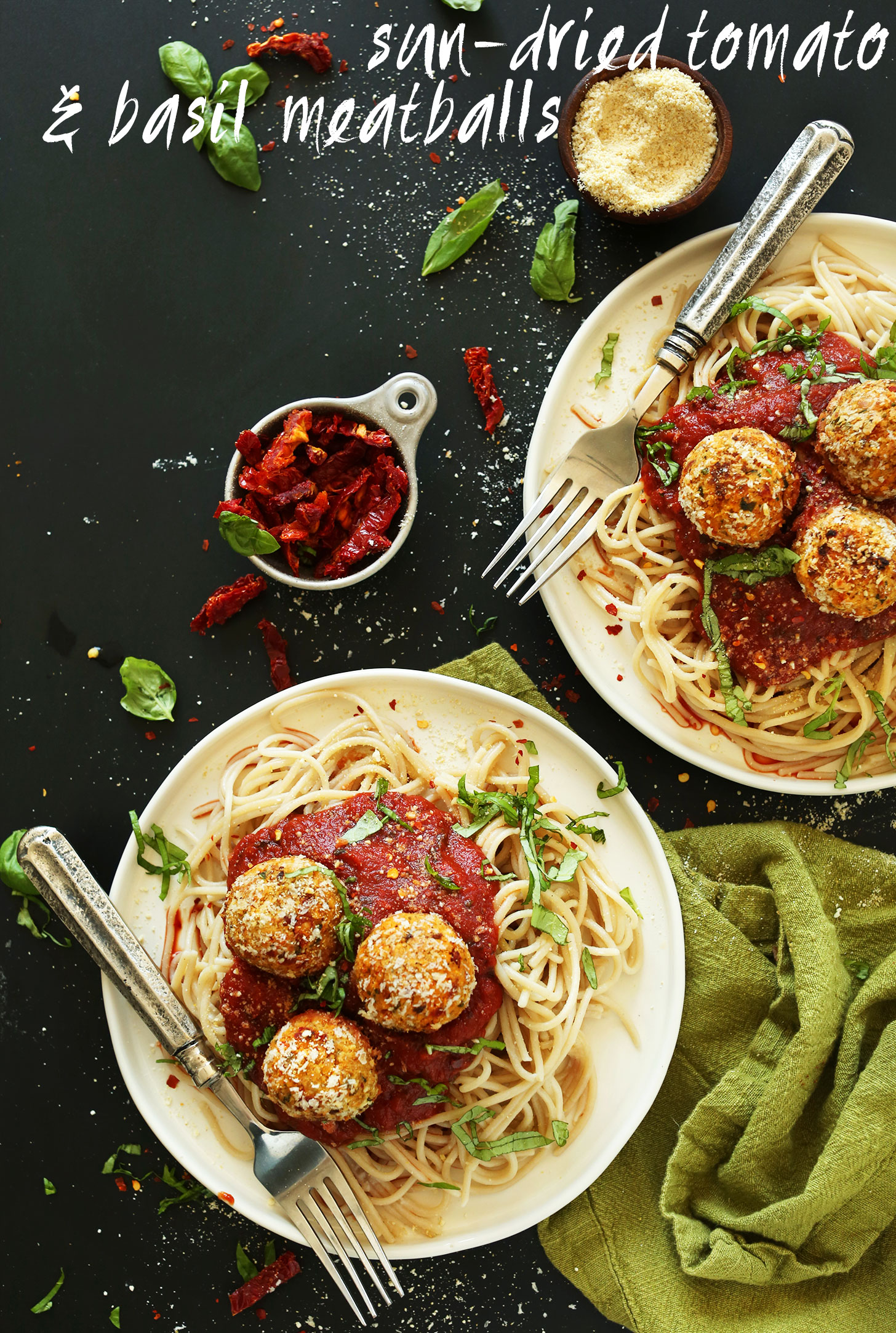 Plates of pasta with marinara and Vegan Chickpea Meatballs for a plant-based weeknight meal