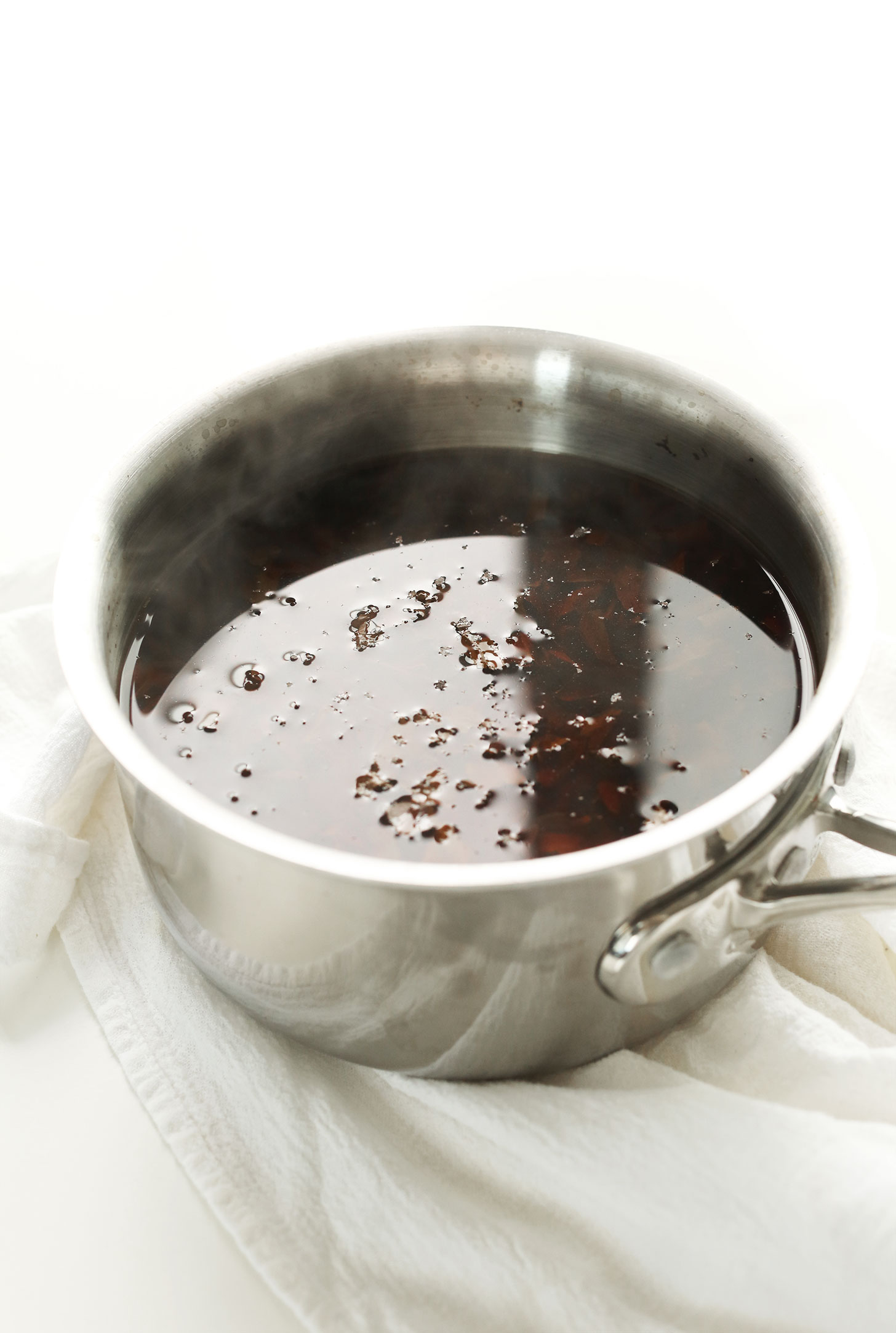 Brewing tea in a saucepan for making Thai Iced Tea