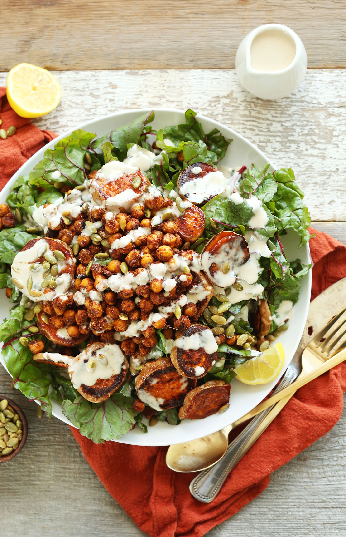 Big dinner salad with Roasted Sweet Potato, Crispy Chickpeas, and a simple Creamy Tahini Dressing