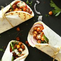 Three healthy Chickpea Shawarma Wraps on a baking sheet