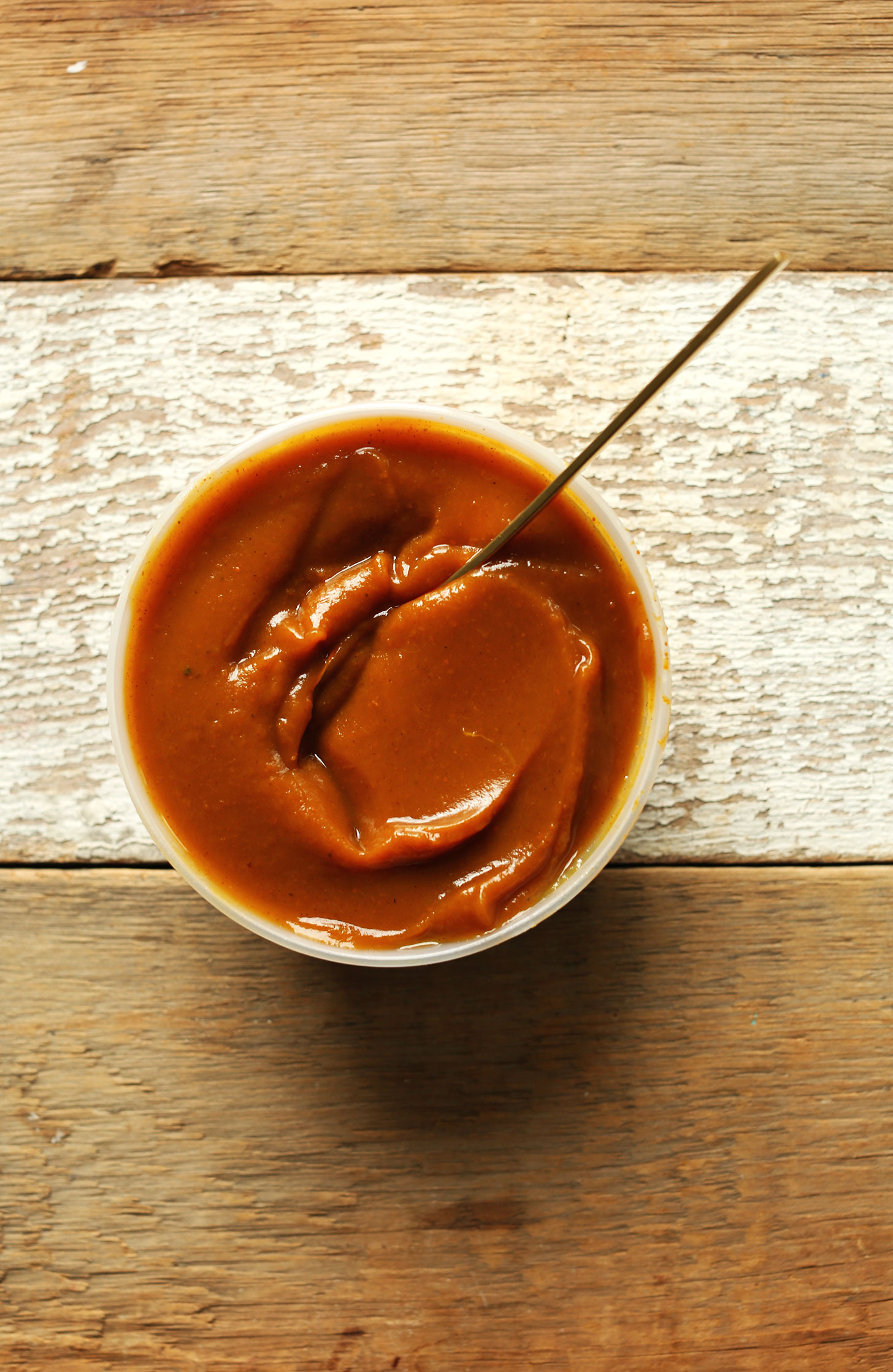 Container of homemade pumpkin butter for making Pumpkin Pie Oats