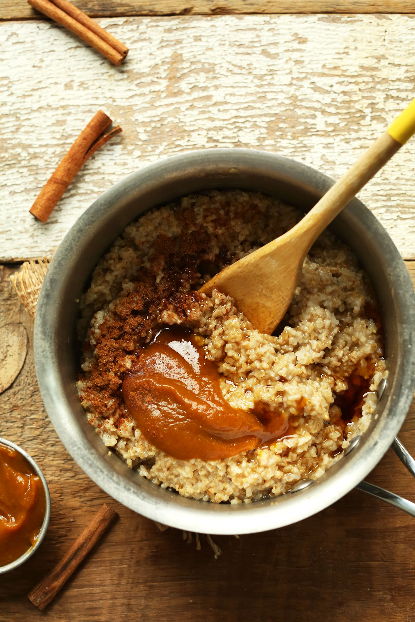 Saucepan with ingredients for making Pumpkin Pie Oats for a delicious vegan breakfast