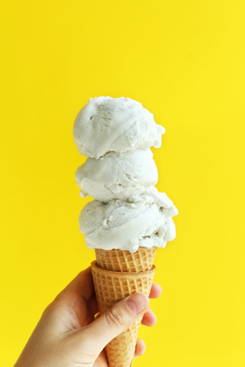 Cone with scoops of coconut vanilla vegan ice cream
