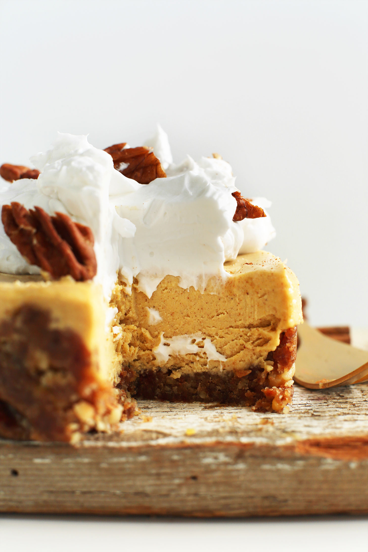 Close up shot showing the creamy texture of our Vegan Pumpkin Cheesecake recipe