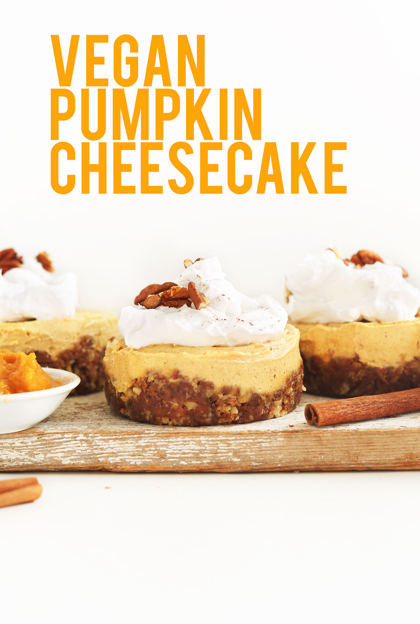 Cutting board with mini vegan pumpkin cheesecakes for a delicious fall dessert
