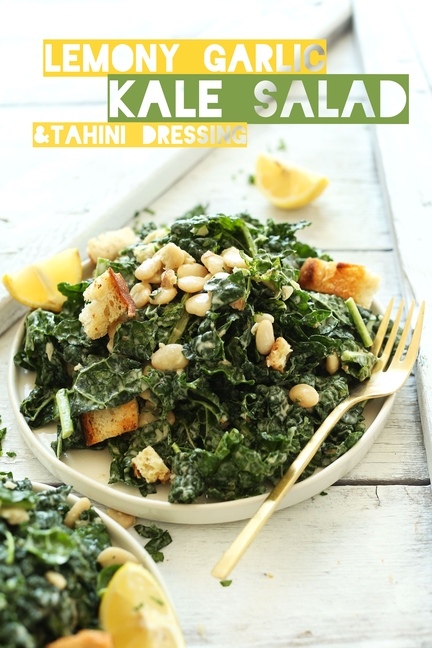Big plate of Lemony Garlic Kale Salad with Butter Beans and Garlic Croutons for an easy vegan dinner