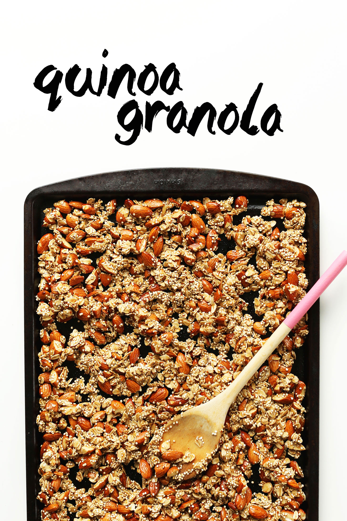 Baking sheet filled with ingredients for our Quinoa Granola with Oats & Almonds