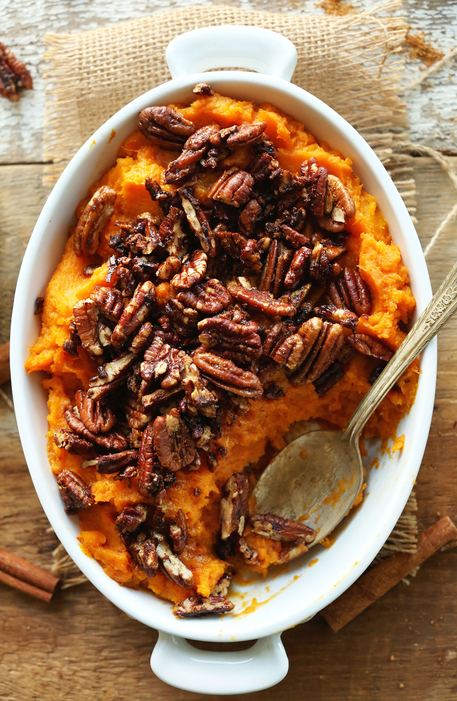 Grabbing a spoonful of our Butternut Squash Sweet Potato Mash for gluten-free vegan Thanskgiving