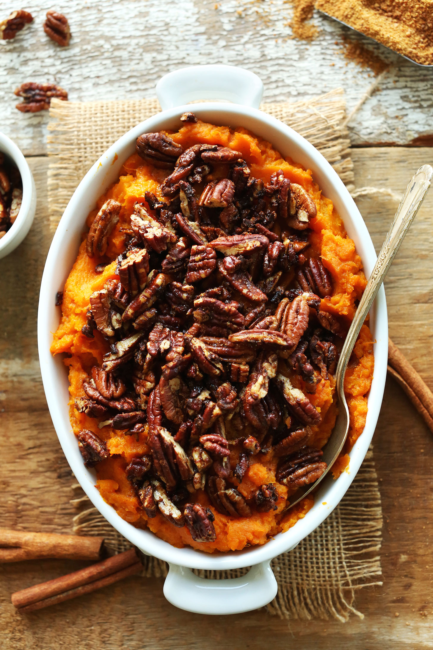 Ceramic baking dish filled with Butternut Squash Sweet Potato Mash for a gluten-free vegan Thanksgiving recipe