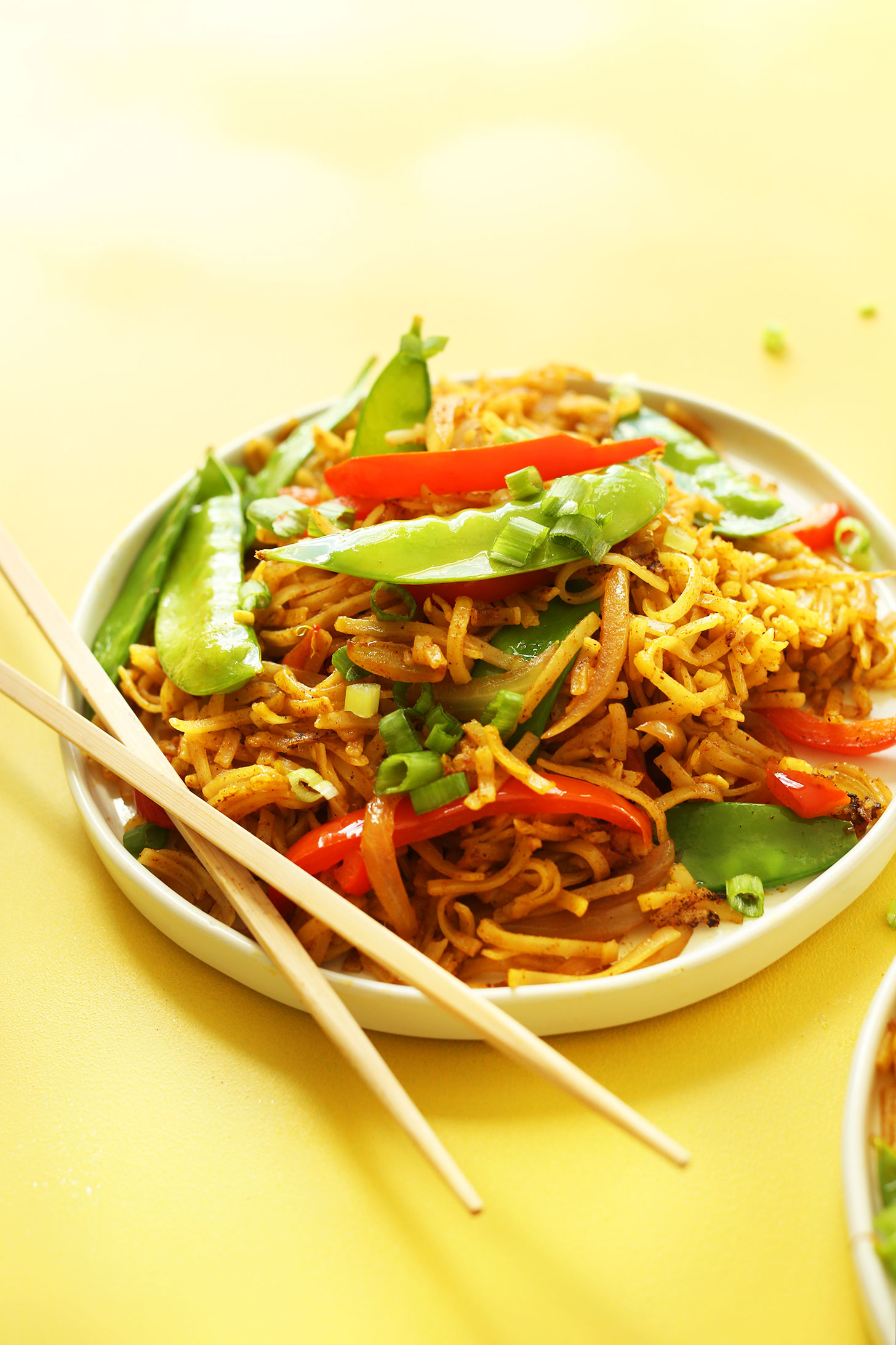 Plate of our Singapore Noodles recipe for a simple gluten-free vegan dinner