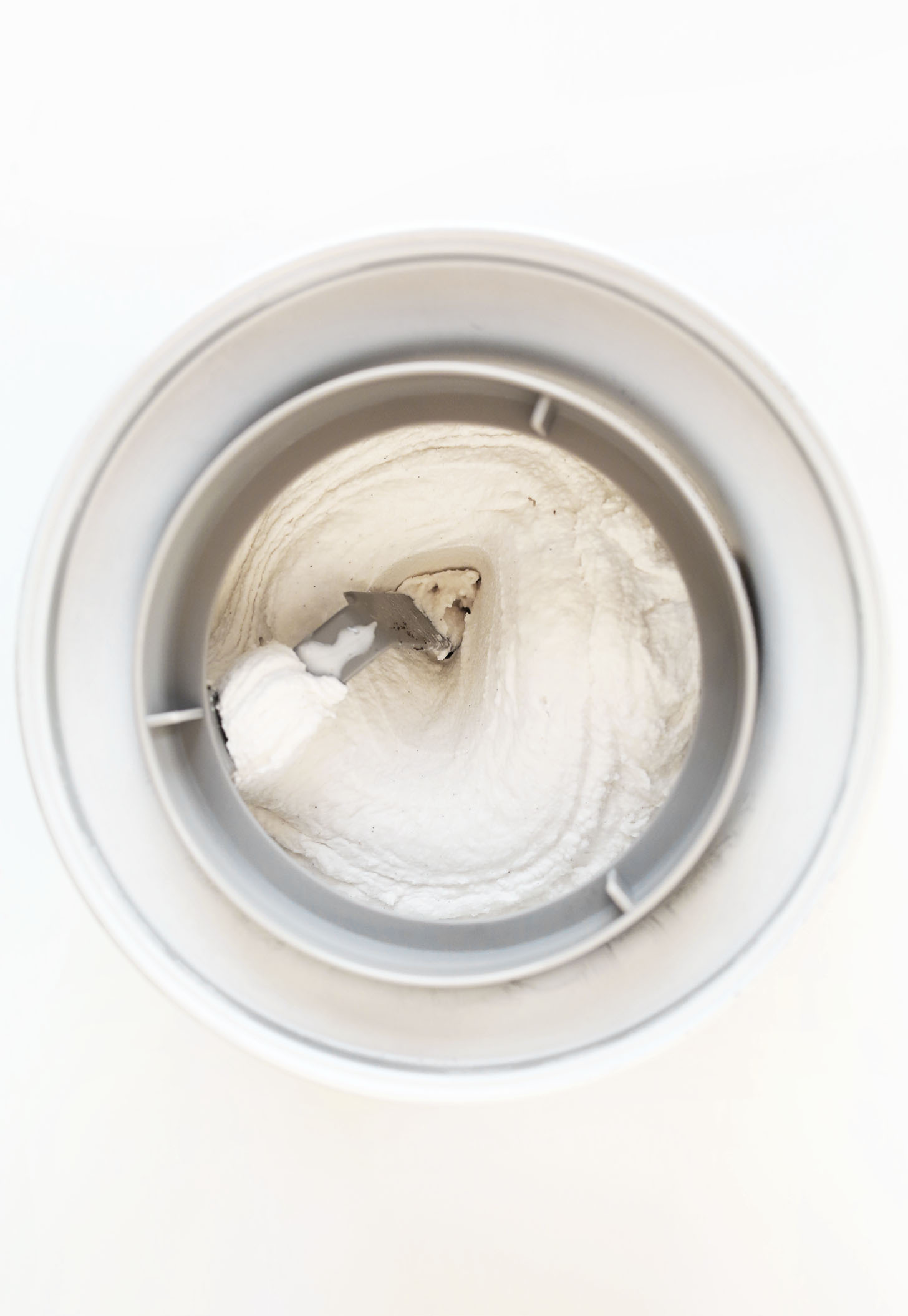 Making vegan coconut ice cream in an ice cream maker