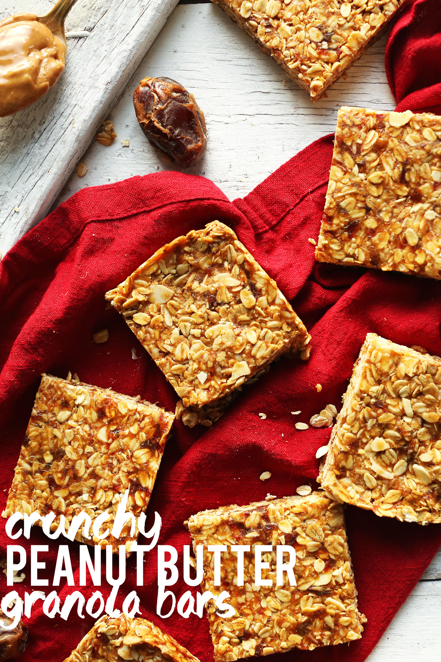 Crunchy homemade Peanut Butter Granola Bars resting on a linen