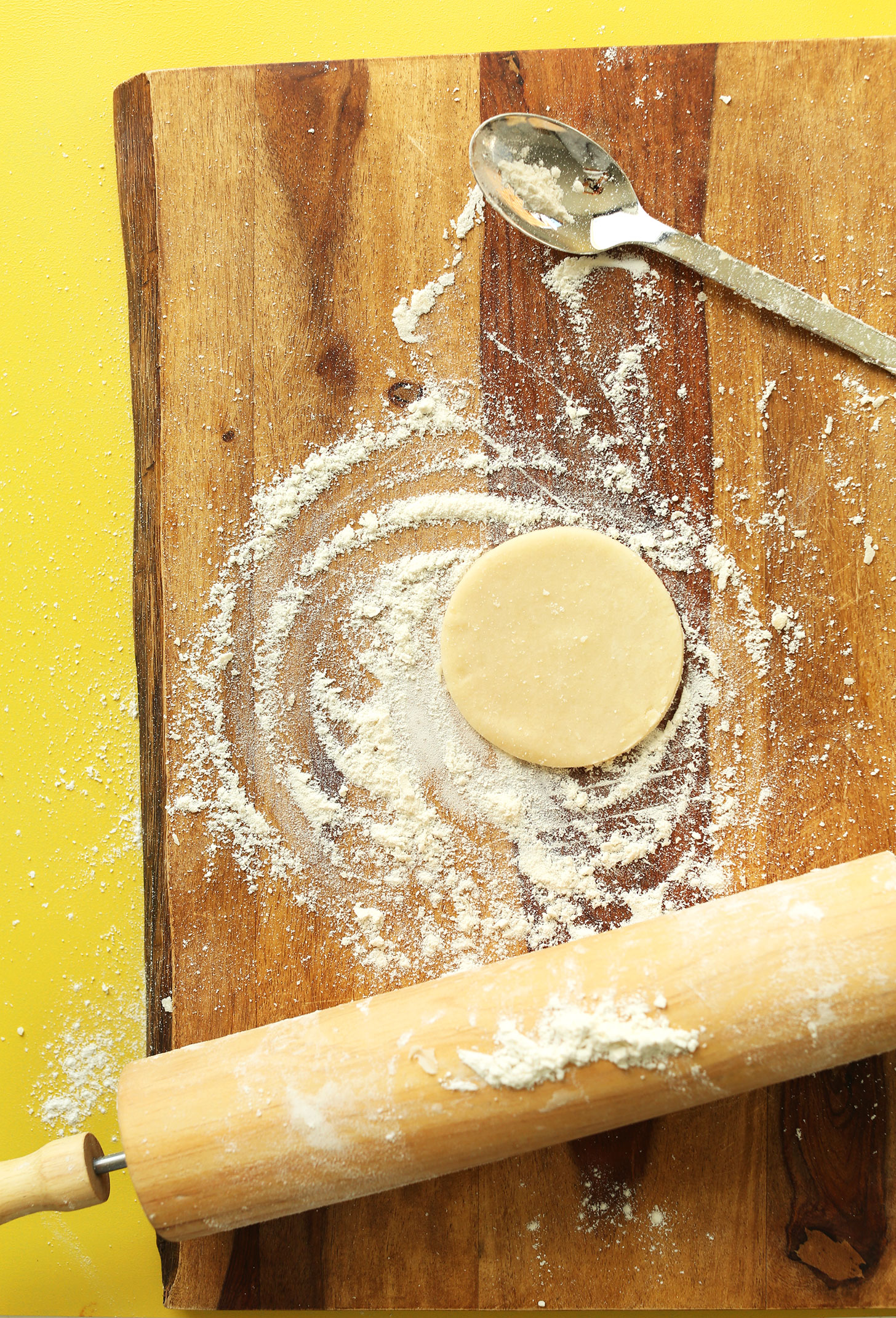 Using a rolling pin to roll out Coconut Oil Pie Crust