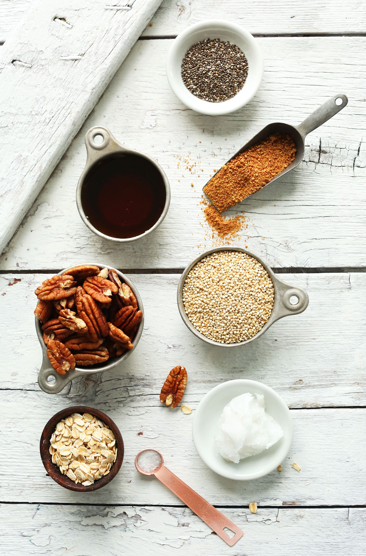 Chia seeds, coconut sugar, quinoa, coconut oil, oats, salt, pecans, and maple syrup for making Quinoa Brittle
