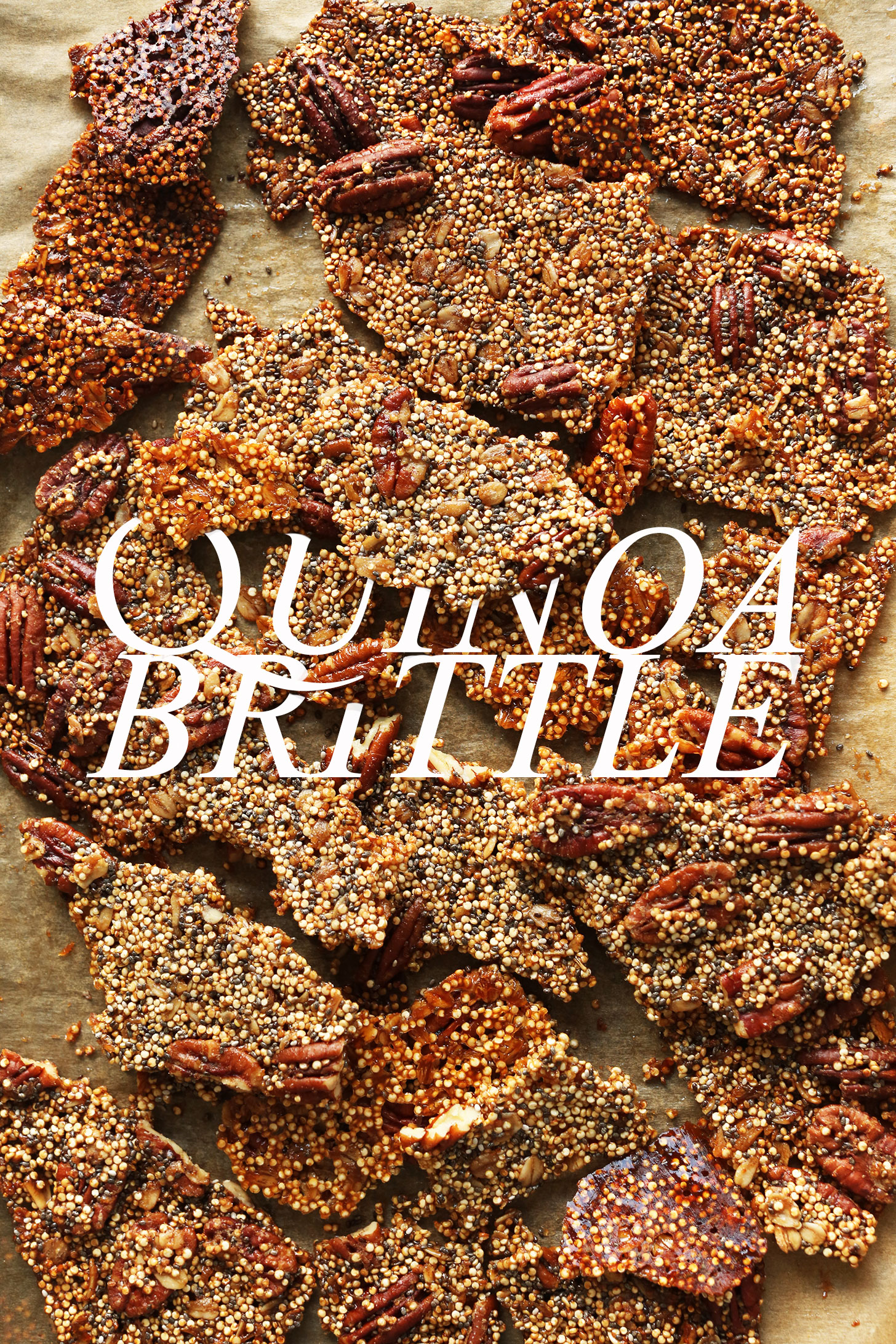 Parchment-lined baking sheet with chunks of our gluten-free vegan Quinoa Brittle recipe